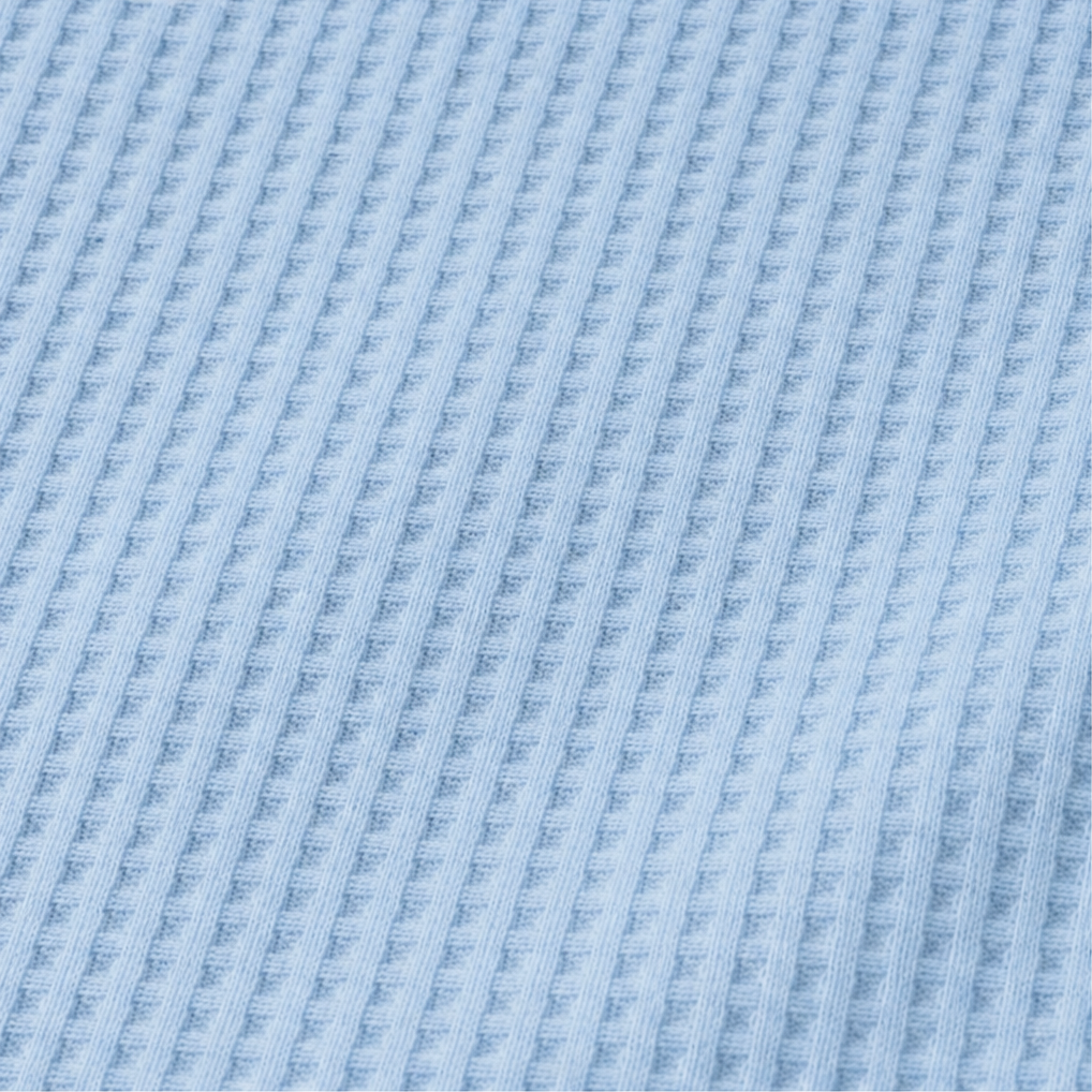 Draperly – Bluzka z asymetrycznym dołem w stylu dzianiny waffle