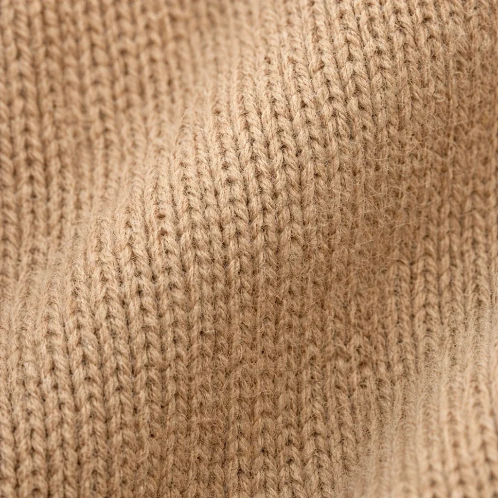 Foldelle – Sweter z asymetrycznym kołnierzem typu fold-over