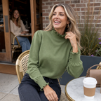 Ruffle & Row – Sweter z falbaną